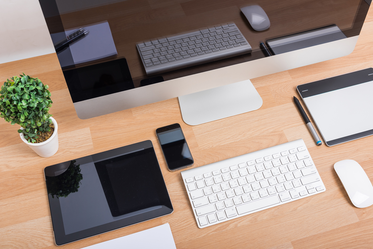 Desk with computer and phone